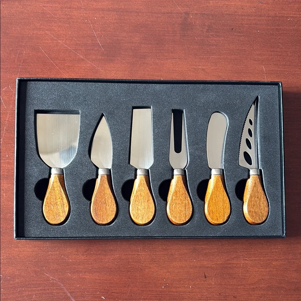 NWOT Elegant Cheese Knife Set with Black and Brown Handles